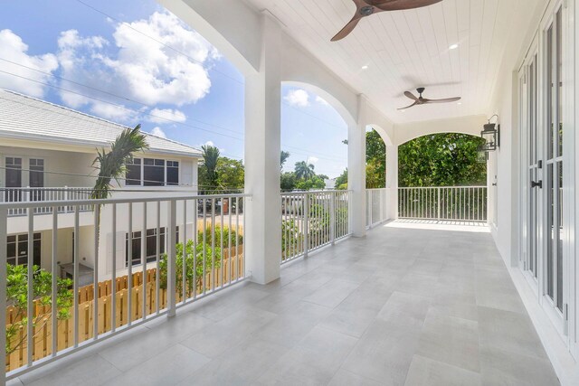 view of patio / terrace featuring a balcony and ceiling fan