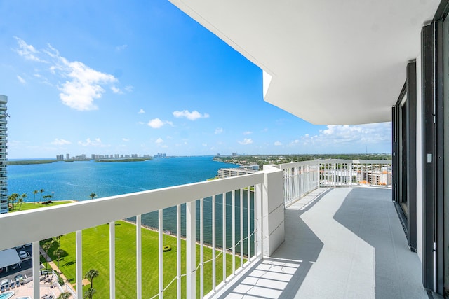 balcony featuring a water view