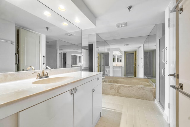 bathroom featuring vanity, plus walk in shower, and tile patterned flooring