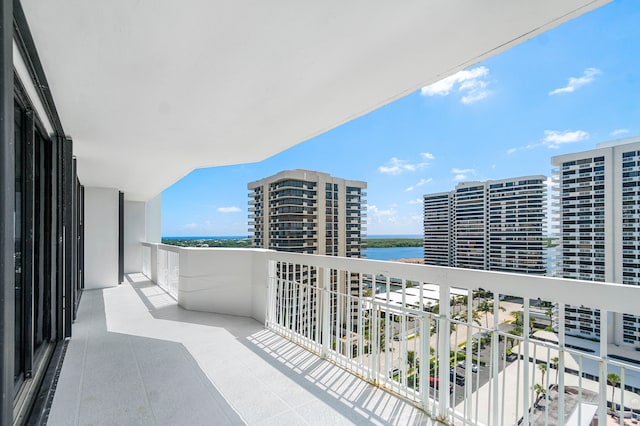 balcony featuring a water view