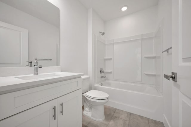 full bathroom with tile patterned floors, shower / bath combination, vanity, and toilet