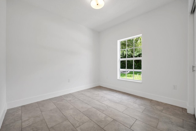 view of tiled spare room