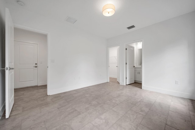 spare room with light tile patterned floors