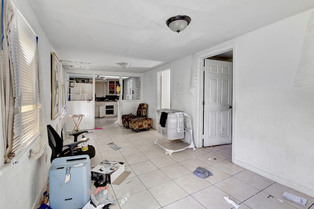 living area featuring light tile patterned flooring