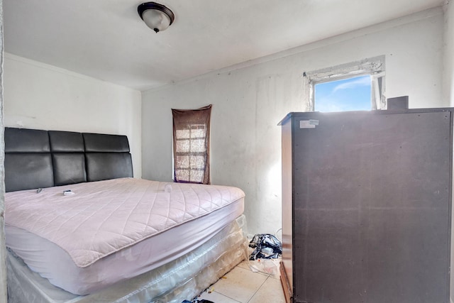 bedroom with tile patterned flooring