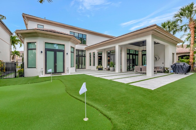 rear view of house featuring a patio area