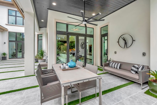 view of patio featuring outdoor lounge area and ceiling fan