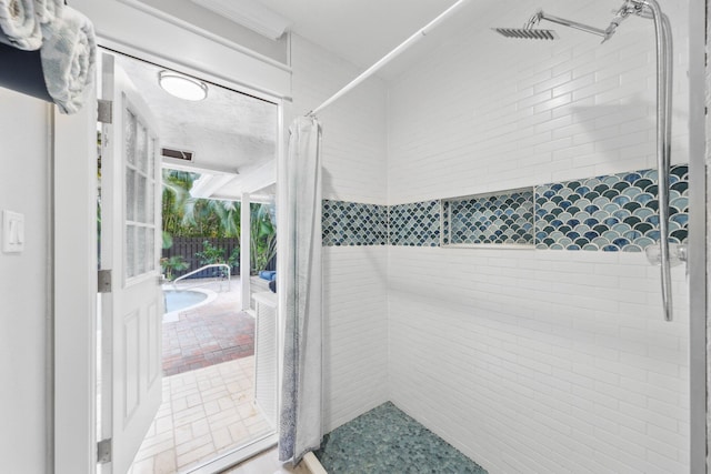 full bathroom featuring a shower stall