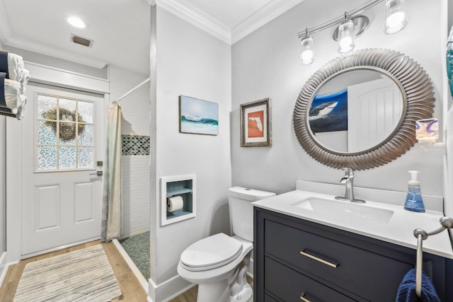 bathroom featuring toilet, wood finished floors, visible vents, tiled shower, and crown molding