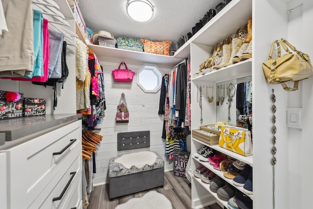 spacious closet featuring wood finished floors