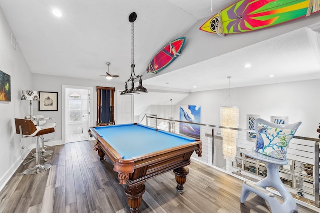 game room with lofted ceiling, pool table, wood finished floors, visible vents, and baseboards