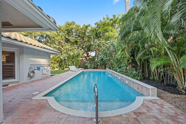 pool with a patio