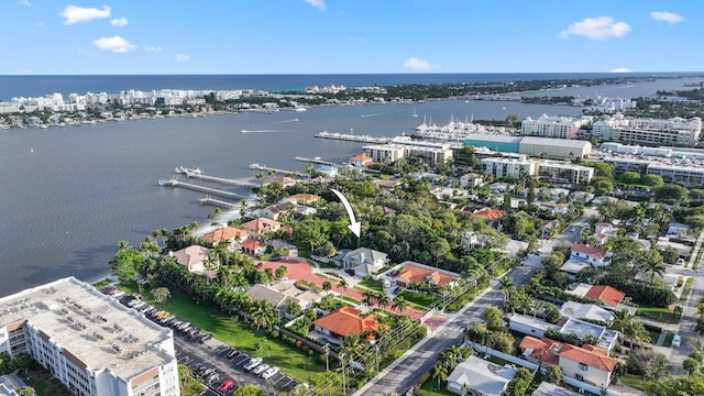 aerial view with a water view and a city view