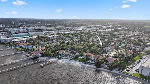 aerial view featuring a view of city and a water view