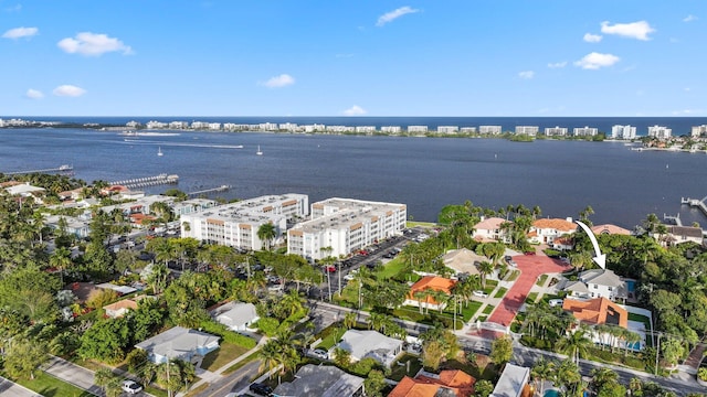 drone / aerial view with a water view