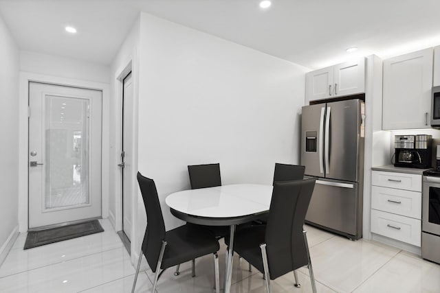 view of tiled dining space