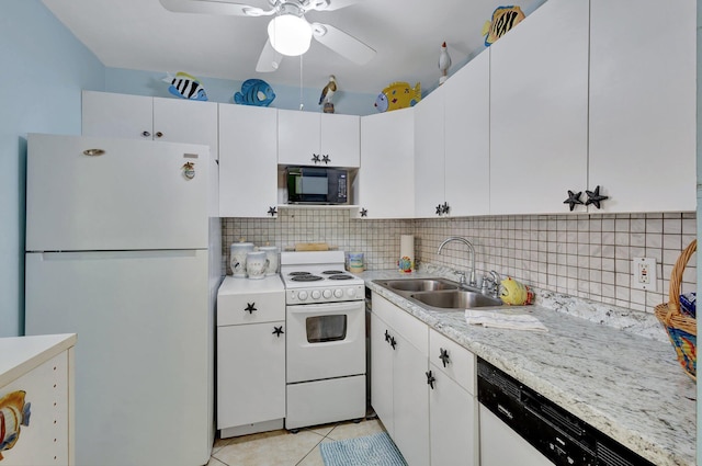 kitchen featuring tasteful backsplash, white appliances, sink, white cabinetry, and ceiling fan