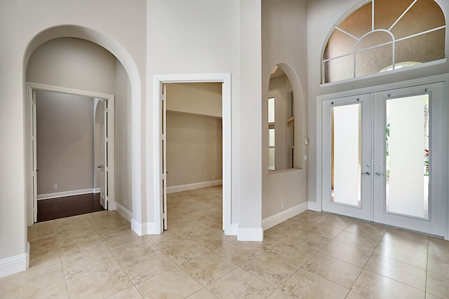 foyer featuring french doors