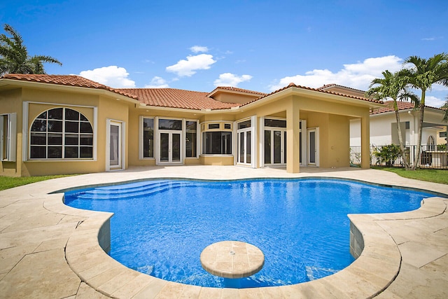 view of pool featuring a patio area