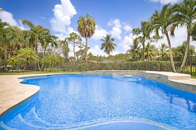 view of swimming pool with a patio