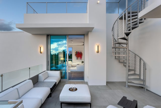 living room featuring a towering ceiling