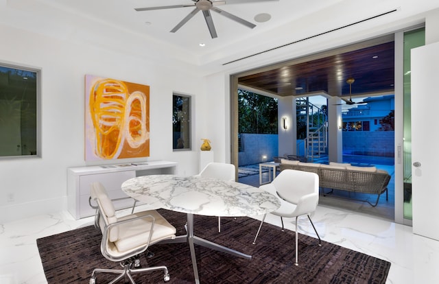 dining space featuring ceiling fan