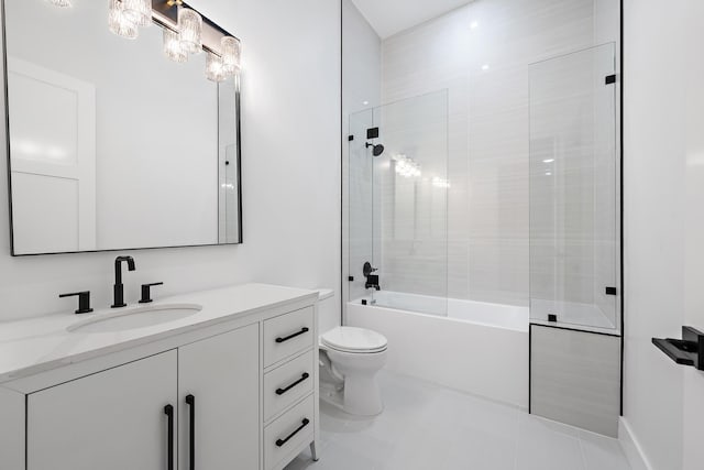 full bathroom with tile patterned flooring, vanity, toilet, and enclosed tub / shower combo