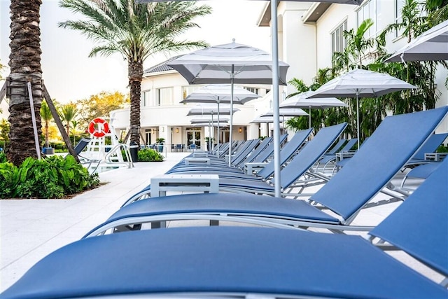 view of swimming pool with a patio area