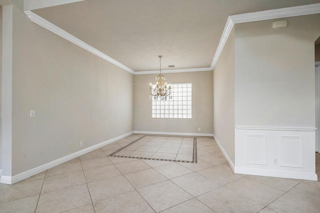 unfurnished dining area featuring an inviting chandelier, ornamental molding, and light tile patterned floors