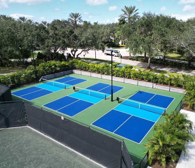 view of tennis court featuring basketball court