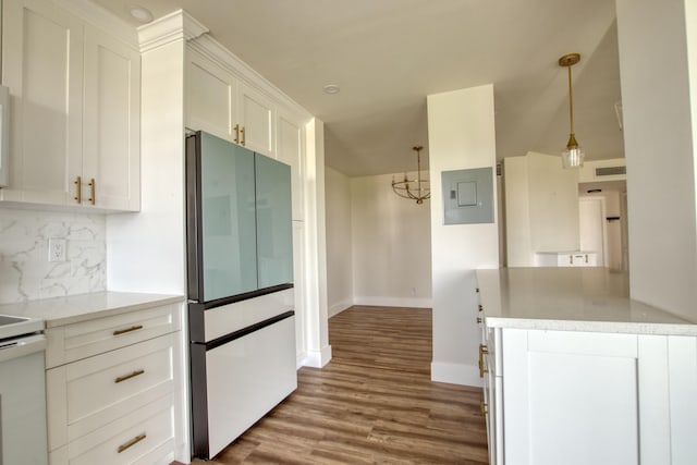 kitchen featuring light hardwood / wood-style flooring, white cabinets, stainless steel refrigerator, stove, and backsplash