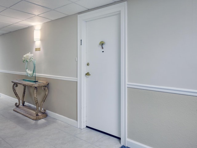 interior space featuring a paneled ceiling