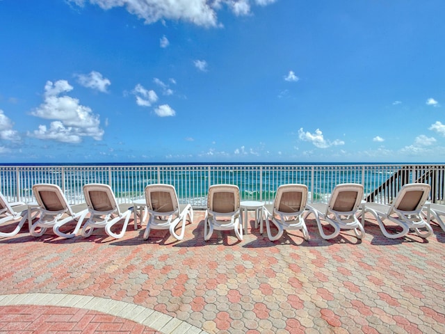 view of patio / terrace with a water view