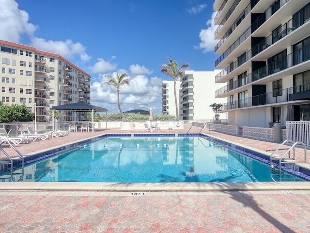 view of swimming pool with a gazebo