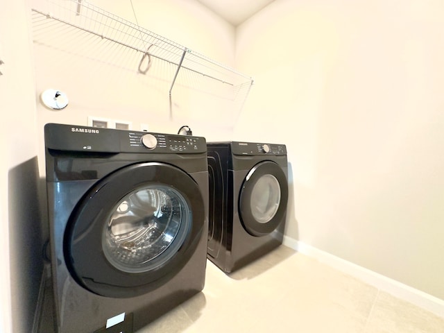 laundry area featuring separate washer and dryer