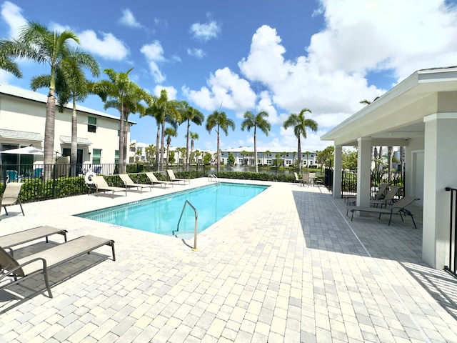 view of swimming pool featuring a patio