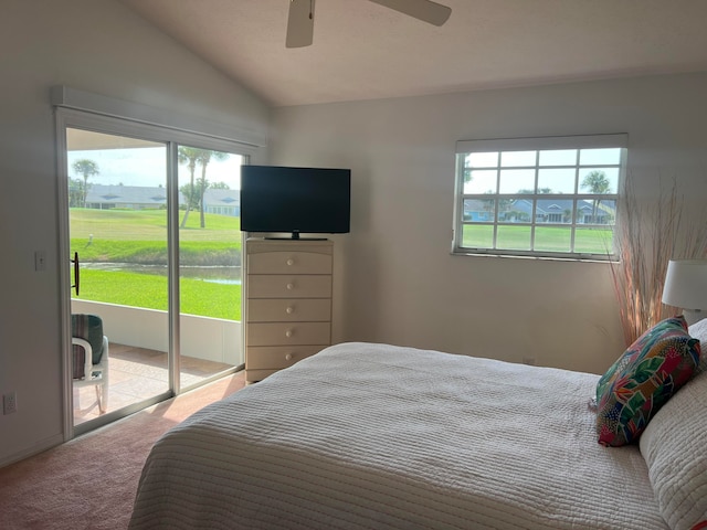 bedroom with light colored carpet, vaulted ceiling, and ceiling fan