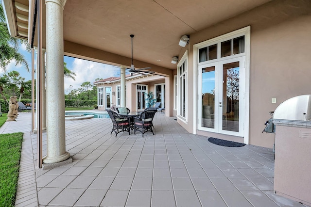 view of patio with grilling area and french doors