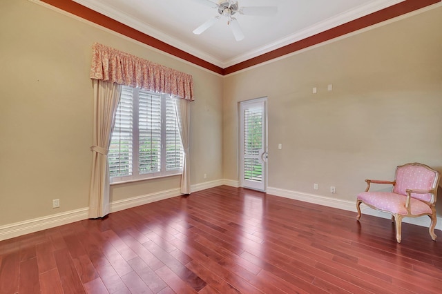 unfurnished room featuring ceiling fan, wood-type flooring, and ornamental molding