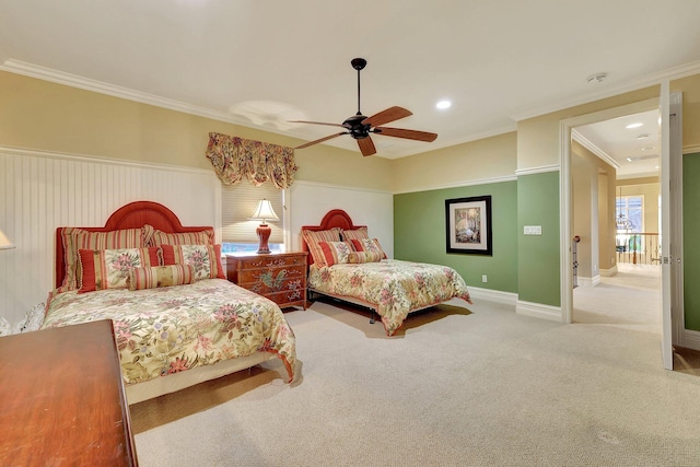 bedroom featuring crown molding, ceiling fan, and carpet floors