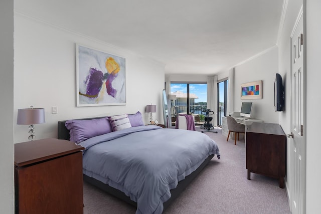 carpeted bedroom featuring ornamental molding