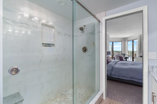 bathroom featuring tiled shower