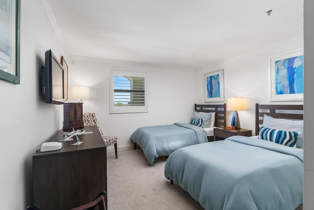 bedroom with crown molding and light colored carpet