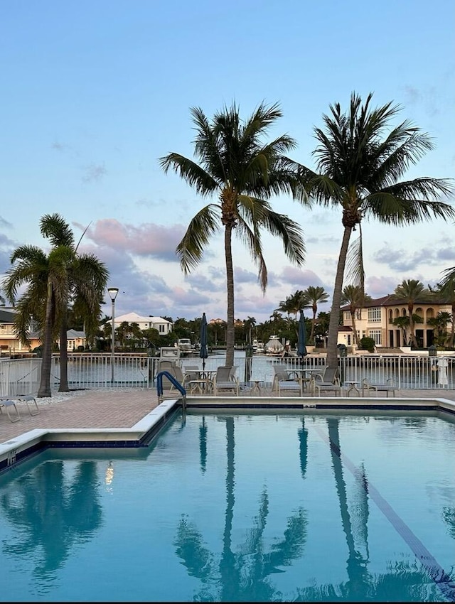 view of swimming pool with a patio area