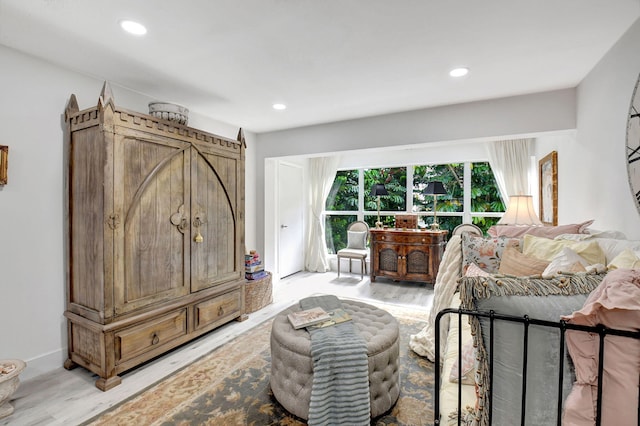 living room with light hardwood / wood-style flooring