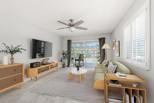 living room featuring ceiling fan