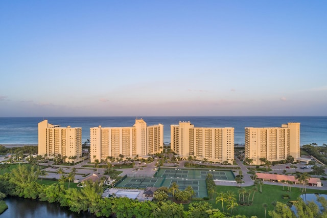 aerial view at dusk with a water view