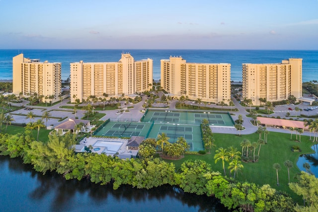 birds eye view of property featuring a water view