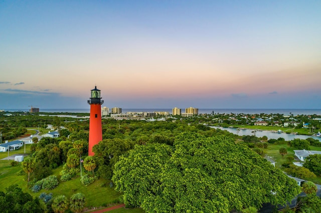 aerial view at dusk with a water view