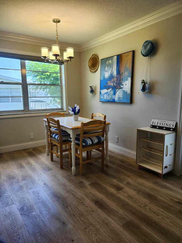 dining area with crown molding, dark hardwood / wood-style flooring, a chandelier, and a textured ceiling